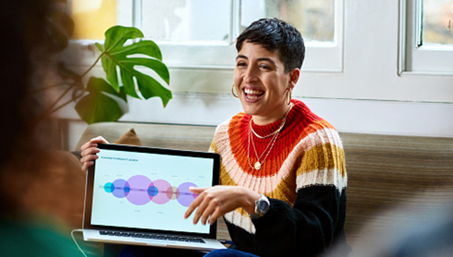 Employee giving a presentation on a laptop.