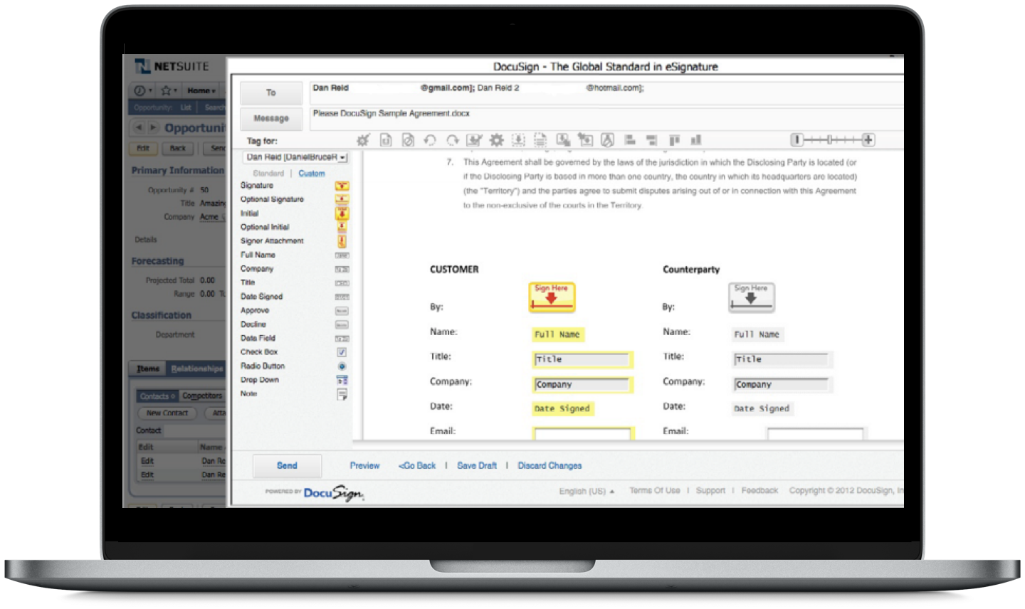 A laptop showing Oracle Net Suite with a DocuSign agreement pop up.