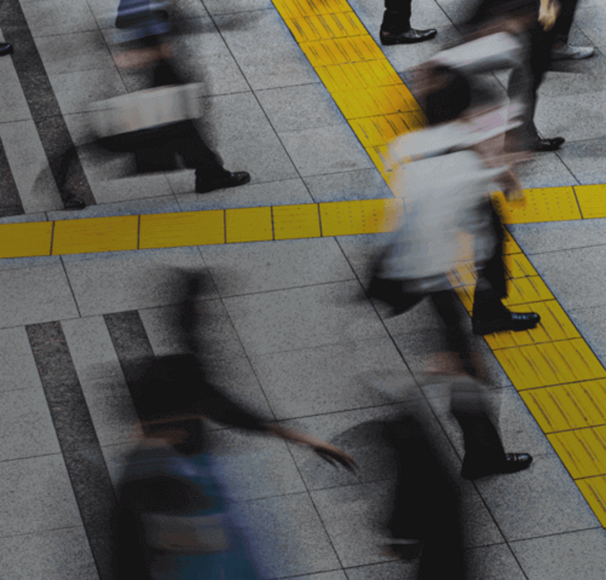 People walking in a public square.